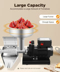 Heavy Duty Electric Tomato Sauce Maker And Fruit Strainer with large funnel filled with strawberries and powerful motor base.