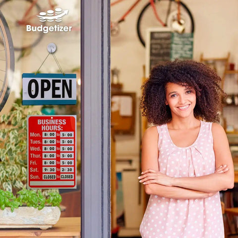 Open Sign Bundle With Business Hours Clock, Double Sided Open Closed Sign, displayed on store window next to smiling woman.