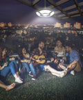 Group enjoys night gathering under Two Pack Solar Shed Light With 136 LEDs Brighter Solar Light Indoor Outdoor Remote IP65.