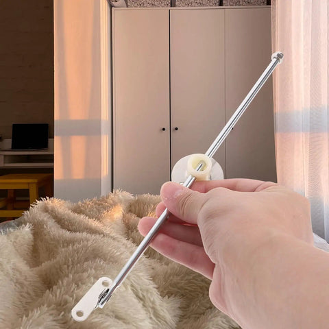 Hand holding heavy-duty metal cabinet support rod hinge, focus on hinges for 4 Pack Cabinet Support Rod Hinges For Kitchen Cabinets And Drop Leaf Surfaces Heavy Duty Metal Clamshell Style Support For Wooden Boxes And Toy Chests Corrosion Resistant High Load Bearing Easy To Install