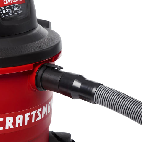 Pro Grade Wet Dry Vacuum Hose Attachment Kit 1.875 Inch Diameter Locking Hose connected to red shop vacuum