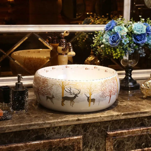 USZWBY Vessel Sinks Bathroom Vessel Sink Nordic Round Ceramic Washbasin Forest Art Countertop Basin with deer design on countertop.