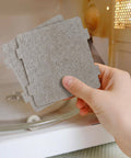 Hand holding 10 Pcs Microwave Mica Sheets Set, Super Thick Heat Shield Waveguide Covers, installing in microwave for kitchen use