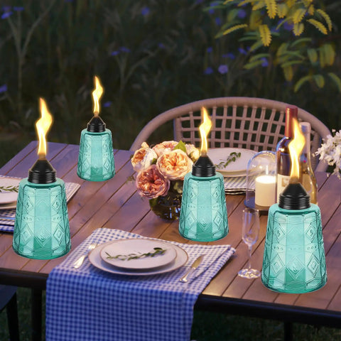 Four Pack Refillable Table Top Citronella Torches With Glass Canisters 12 Oz Each Blue Outdoor Lighting on dining table