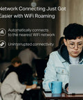 Person using laptop with Nano AC600 USB WiFi Adapter Archer T2U Nano Dual Band USB Network Transceiver for PC desktop travel size