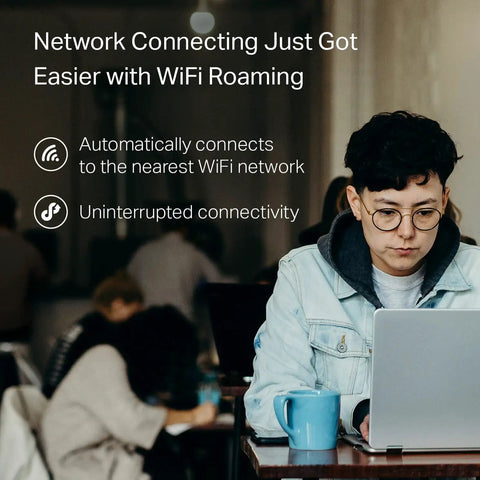 Person using laptop with Nano AC600 USB WiFi Adapter Archer T2U Nano Dual Band USB Network Transceiver for PC desktop travel size