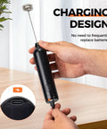 Person holding Rechargeable Handheld Milk Frother With USB Type C 3 Speed Adjustable Foam Maker for coffee drinks.