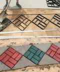 Cross Square Stepping Stone Molds Set For DIY Garden Pathways And Patios with 8 unique shapes in use, creating colorful walkway.