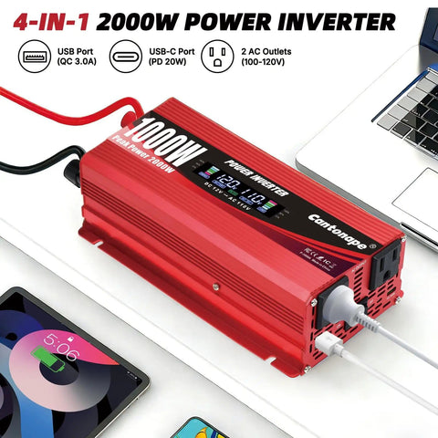 Red 1000W Car Power Inverter with LCD Display and dual AC outlets on white table, connected to a laptop and tablet