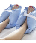 Foot Pain Relief Heel Cushion Protector Pillow Set Of 2 With Adjustable Velcro Straps shown on feet, blue and white color.
