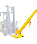 Heavy Duty 4400Lb Forklift Jib Boom Crane With Dual Hooks And Easy Slide On Adjustments For Fast Material Moving And Real Deal Daily Heavy Hauling Tasks mounted on forklift with yellow arm extended.