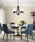 Farmhouse 5-Light Chandelier Pendant Light In Black Finish With Clear Glass Shades in dining room setting.