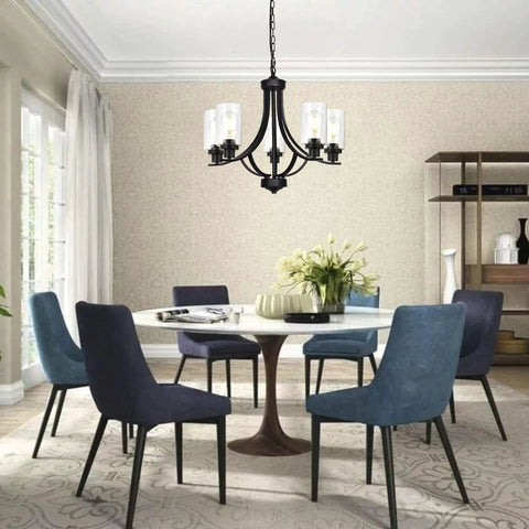 Farmhouse 5-Light Chandelier Pendant Light In Black Finish With Clear Glass Shades in dining room setting.