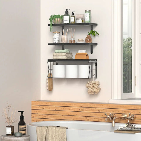 Heavy Duty Floating Bathroom Shelves Wall Mounted Set Of Three With Slick Black Finish For Over Toilet Storage And Moisture Resistant Solid Wood Shelving That Handles Daily Use Without The Drama featuring toiletries and towels.