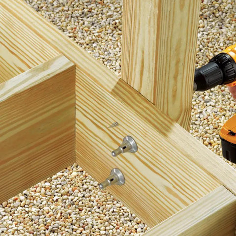 Installation of ThruLOK Eight Inch Screw Bolt Fastening System 24 Count Silver No Pre Drilling Required on wooden beams.