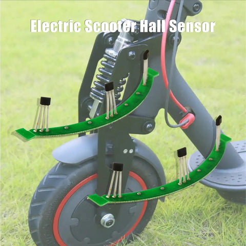 Two Pack Plug And Play Electric Scooter Hall Sensor Board For Hub Motors PCB Hall Effect Sensors Replacement Easy Install And Durable Drop In Compatible With M365 Electric Scooters, shown on green grass, highlighting installation on scooter hub.