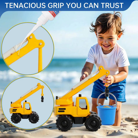 Child playing with toy excavator on beach next to a bottle of glue, showing repair use of Crystal Clear Glass Adhesive For Cracks And Repairs Heavy Duty Waterproof And Heat Resistant Glue That Binds Like A Boss For Mirrors Acrylic Plexiglass Windows Metal DIY Crafts And Rhinestones.