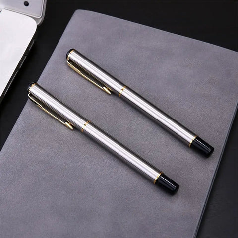 Two Stainless Steel Golden Rollerball Pens With Smooth Ink Flow And Comfortable Grip A Slick Office And School Stationery Essential
