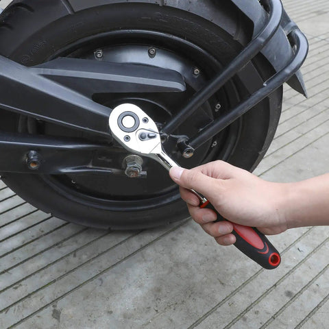 Using One Half Inch Drive Ratchet Socket Set With Ten Sockets From Ten Through Fifteen Seventeen Nineteen Twenty Two Twenty Four Millimeter Plus Two Way Quick Release Ratchet Handle And Extension Bar Chrome Vanadium Steel Built For Durability on a vehicle wheel