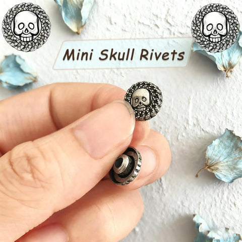 Top Shelf Badass Metal Skull Buttons And Screw Back Rivets For Leather Crafting 100 Pc Bulk Set close-up of mini skull rivets in hand.