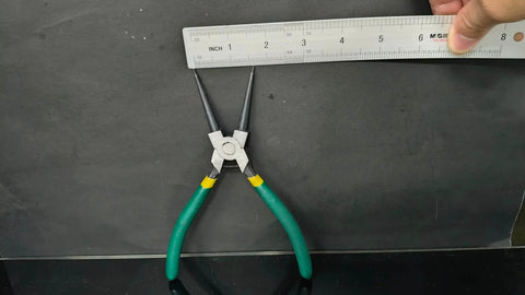 4 Piece Snap Ring Pliers Set With 7 Inch Round Nose C Clamps For Snap Ring Removal, measuring with ruler, black background