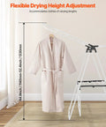 Heavy Duty Two Tier Clothes Drying Rack With 31 Sturdy Rods And Sock Clips Foldable Metal Laundry Stand showing adjustable height with a robe.