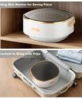 Slick Collapsible Mini Washing Machine With 13L Spin Basket And Quick Flip Design inside a suitcase for travel convenience.