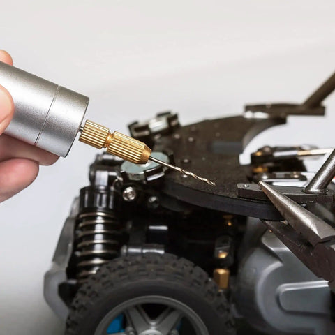Drilling small holes in a model car using a 5 Piece 0.6mm Mini Micro Twist Drill Bits Set In High Speed Steel Extra Long 80mm Shank.
