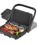 Dash MultiMaker Flex Press Grill With Swap-It Plates, Electric Indoor Countertop Nonstick cooking chicken and vegetables on grill.