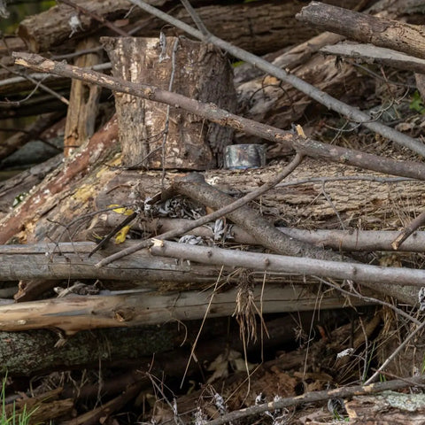 Realtree Camo Duct Tape Roll 1.88 Inch Wide By 10 Yards Beefy Heavy Duty Craft Tape on pile of logs and branches