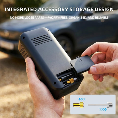 Close-up of hands holding cordless car tire pump with integrated accessory storage and attachments, fits cars and bikes.