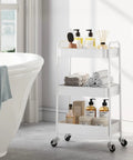 Three Tier Rolling Cart Metal Utility Storage Organizer With Lockable Wheels next to bathtub in bathroom setting