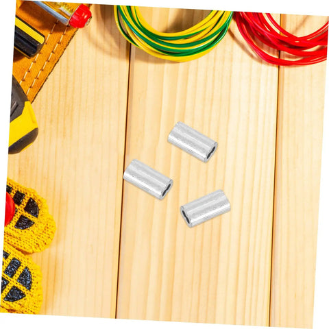 Kick Ass Heavy Duty Aluminum Cable Sleeves, Eight Shaped Snare Wire Ferrules For USB C Charger Ends And Phone Cords, arranged on wood background.