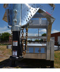 3/8 Inch Grade 70 Agricultural Safety Chain with Clevis Grab Hook attached to trailer, 5 ft long, for farming use