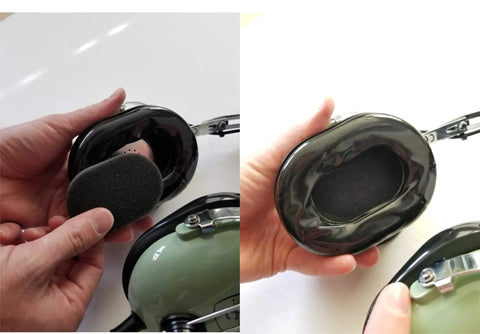 Hands inserting soft foam ear cup insert into aviation headset, showing 2x3 inch size and snug fit for long hauls, made in USA.