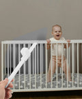 Heavy Duty Adjustable Bed Rail Guard Hardware With Smooth Lifting Tracks And Heavy Duty Fastener shown near baby crib