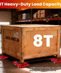 Heavy Duty Machine Skates 4-Pack Move Massive Loads With Ease. 8-Ton Carbon Steel Dolly Set under a wooden crate in a warehouse.