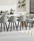 Swivel Bar Stool With Back Rest 26 Inch Counter Height Gray Linen Fabric Upholstered Seat in modern kitchen setting