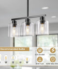 Sleek Black Three Light Kitchen Island Pendant Lamps Using Dimmable E26 Base, featuring three glass shades and bulbs.