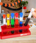 Six Colorful Plastic Test Tubes Kit With Caps And Rack For Home Science Experiments displayed in a festive room.