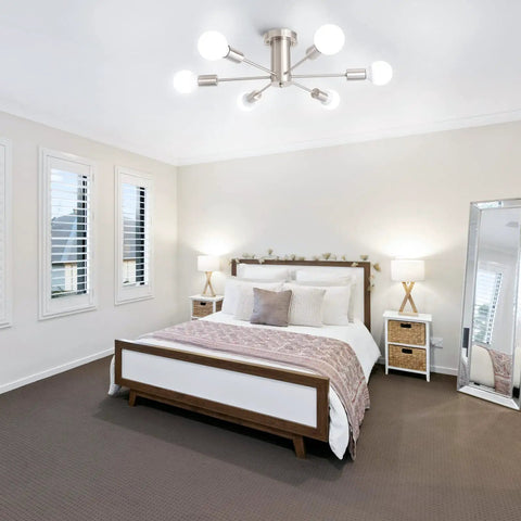 Dope Six Light Sputnik Style Ceiling Fixture In Brushed Nickel Finish in a bedroom setup with modern decor