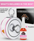 Front view of round white double-sided neodymium fishing magnet with lifting ring; pink trim beside threadlocker bottle and box.