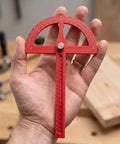 Heavy Duty Angle Finder With Dead Nuts Secure Locking Swing Arm Reads Zero To One Eighty Degrees held in hand for precise angle measurements.