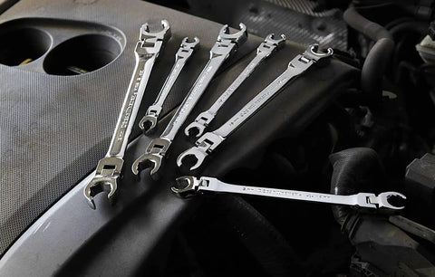 Six Piece Flex Flare Nut Wrench Set Metric With 180 Degree Flexible Head on car engine showing use in tight spaces
