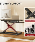 Sanodesk 35 Inch Electric Height Adjustable Standing Desk Converter Riser with sturdy support and alloy materials, ideal for home office.