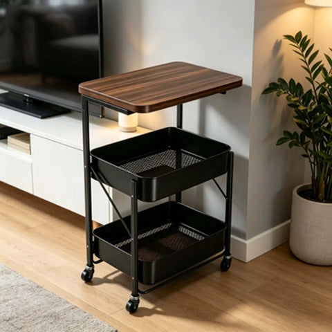 Versatile 2 Tier Rolling Utility Cart With Solid Wood Top And Reinforced Steel Mesh Basket Hella Sturdy Storage Trolley Smooth Glide Kitchen Organizer And Small Space Daily Flex next to a TV.