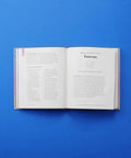 Open astrology book showing Taurus transit information, part of 'Handle The Mercury Retrograde Chaos Without Losing Your Cool With This Essential Astrology Guide To Level Up Your Chat Skills And Keep Your Daily Vibes Locked.'