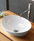 NUESTRA VIDA Overhead Sink Oval Ceramic 16.1 * 13 * 5.5 IN - Small Bathroom Hand Sink displayed above wood counter.