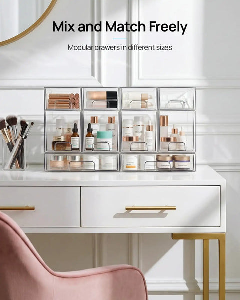 Compact Clear Stackable Storage Drawers Four Pack Super Sleek Plastic Organizer Bins For Narrow Bathroom Counters Under Sink Vanities And Kitchen Shelves Clean Up Like A Pro Fast displayed on a sleek white desk with various beauty products organized inside.