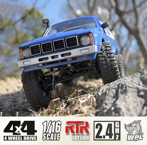 All Terrain 1/16 Scale RC Rock Crawler 4x4 Ready To Run Pickup Truck with LED Lights on rugged terrain
